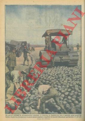 BELTRAME A. - - A Croydon, dove  raccolta gran parte del bottino di guerra, si adoperano migliaia di elmetti tedeschi per pavimentare le strade.