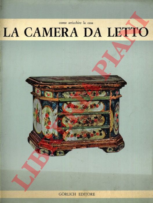 - - La camera da letto.