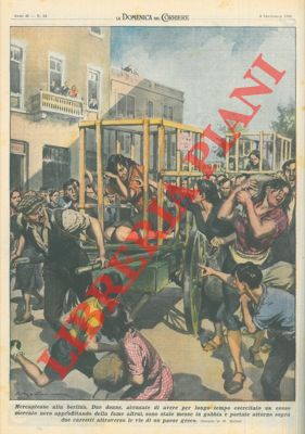 MOLINO W. - - Due donne, accusate di aver esercitato il mercato nero, sono state messe in gabbia e portate per le vie di un paese greco.